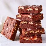 Martha Stewart Instagram – Earn plenty of brownie points by offering these chewy, gooey treats to your kids or to friends on any festive occasion. What makes them so extra? The fudgy base is covered with pecan halves, cream caramel, and melted chocolate—a combo borrowed from old-fashioned turtle candies. Get the recipe at the link in our bio. 📷: @ren_fuller