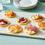 Martha Stewart Instagram – These bite-sized silver dollar pancakes can be served well beyond the breakfast table. Their mild, slightly sweet flavor and small size are perfect for topping with both sweet and savory ingredients. They can be passed around during cocktail hour as a simple hors d’oeuvre, or even served with a cup of coffee or tea at dessert. No matter when they’re served, you’ll flip for these fluffy bite-sized cakes. Get the recipe at the link in our bio. 📷: @kelseynhansen