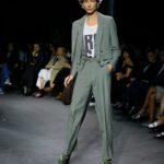 Vivienne Westwood Instagram – Look #16, featuring the Cropped Bellboy Jacket, styled alongside the Humphrey trousers in silk linen, from the Andreas Kronthaler for Vivienne Westwood Spring-Summer 2024 collection.⁠
⁠
#AKVWSS24