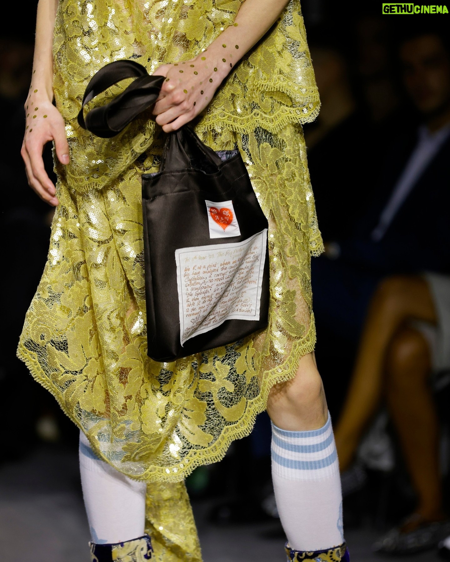 Vivienne Westwood Instagram - 'She had a very special relationship to time, she truly travelled in her mind' – Andreas on Vivienne.
Look #18 from the Andreas Kronthaler for Vivienne Westwood Spring-Summer 2024 collection, featuring elevated platforms, styled alongside a small show tote bag, and the Calypso Dress in sequin cotton lace.
#AKVWSS24