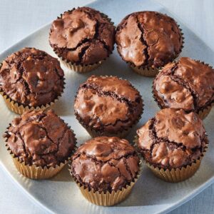 Martha Stewart Instagram - A chocolate lover's dream, these triple chocolate brownie cups are the most chocolaty treat we know. When you mix the different chocolates in this recipe, the result is a dense, dark chocolate brownie base that’s studded with milk-chocolate and white-chocolate chips. Baked in muffin cups, they’re easy to transport to a potluck or party and fit nicely into a lunchbox. Get the recipe at the link in our bio. 📷: @rachelfromiowa