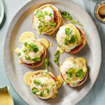 Martha Stewart Instagram – Eggs Benedict may seem like a feat of timing best left to the pros, but our recipe helps you pull it off at home. The trick is to do as much as you can in advance. About a half hour before showtime, pre-poach the eggs, whip up the hollandaise, and split the muffins. When it’s time to dine, you’ll play short order cook for a few minutes then you’ll sit down to eat (and bask in the compliments!). Get the recipe at the link in our bio. 📷: @chrisrsimpson