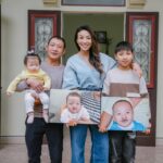 Jeannie Mai Instagram - Journeying with @smiletrain deep into the heart of Vietnam, I found myself two hours outside of Hanoi in Thọ Nghiệp, where I met an extraordinary family. The father and three of his four children were born with clefts, symbolizing both their generational challenges and resilience. I was moved by the profound impact that advancements in care have had on their lives—care that wasn’t available when the father was young. As parents, the father and I prayed strength and joy for  our children over a delicious home cooked meal prepared by his family, leaving a lasting imprint on my heart❤️1 in 700 babies are born with a cleft, and every three minutes, a new life begins with the same challenge. Join me as we continue to explore these beautiful, brave journeys with #Smiletrain to celebrate their 25th anniversary.