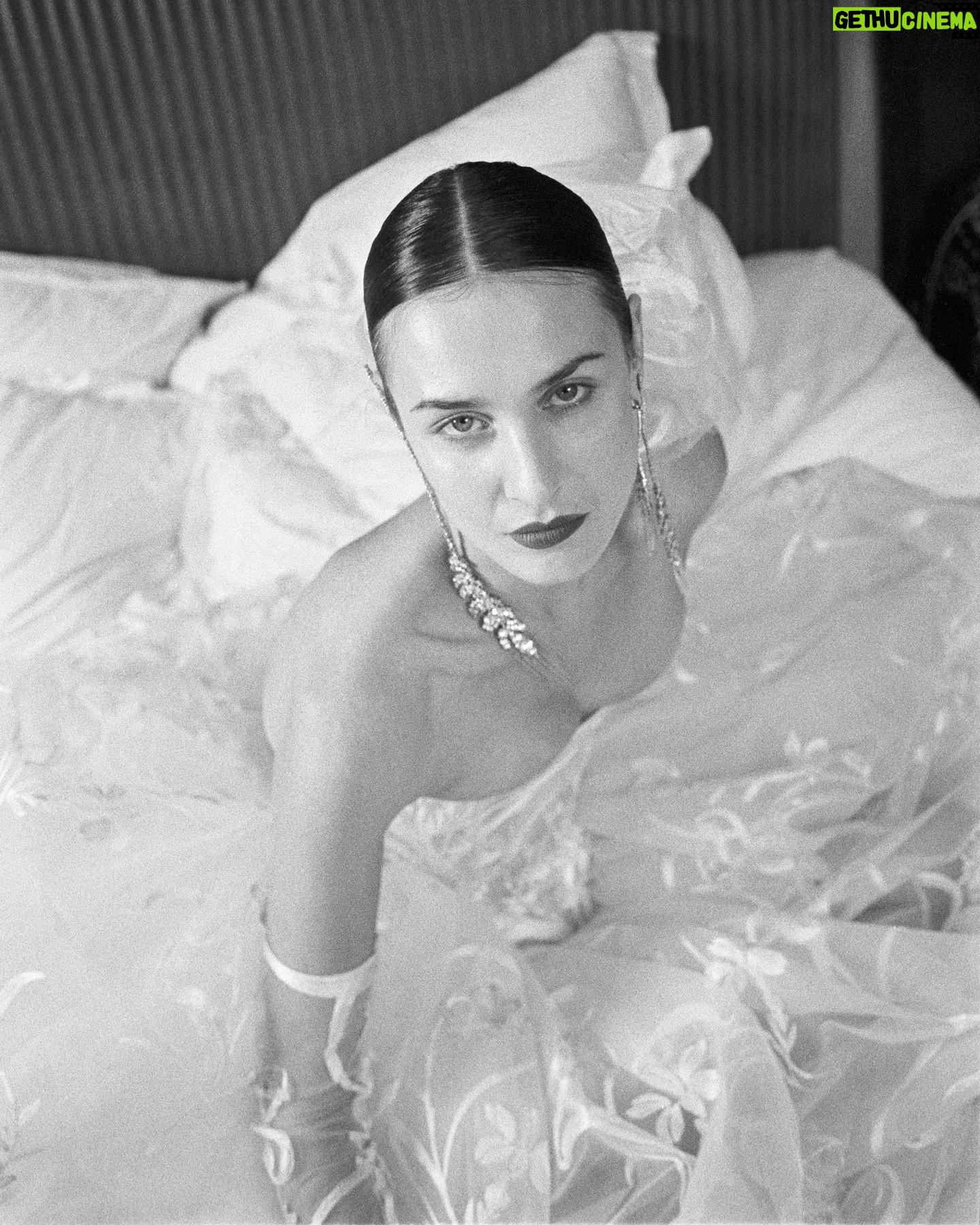 Vivienne Westwood Instagram - The Eline gown offers an unwavering sense of romanticism, embroidered with a Flora motif, taken from an archival couture lace.
The dress features a voluminous skirt with panniers, along with a straight neckline and transparent boned low hip corset bodice, accentuating the waistline.
The look is styled with fingerless gloves, echoing the decorative detail of the dress.
Photography by @kingsley_ifill
Styling by @florahuddart
Talent: @elinehoyois
#VWBridal #WestwoodBridal