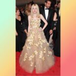 Dakota Fanning Instagram - 2011. My first Met Ball in @maisonvalentino Also just noticed Bradley Cooper in the background ha!  #tbt #metball #valentino #babyface