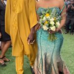 A.J. Johnson Instagram - HERE COMES THE BRIDE!!!!😝🙌🏾🙌🏾🙌🏾💚💛 Nadia is from the Northern region of Ghana which I am learning is rich in different culture traditions from Accra. The Kinte Nadia wears is a different heavier fabric and weave pattern. Notice there are no “flower girls” these girls are clearing the energy for the bride as she enters her new life. Normally- they stay with the bride for days to help her acclimate to her new life as a wife. “The caller” announces something important to the village from a rooftop and all rooftop callers hear this call and spread the message- a main communication tradition in Nadia’s village. Blessings to my brother and sister @queennad_5b and @why_fynn May God cover your union in abundant grace and favor🙏🏾💚💛😘😘😘😘🇬🇭