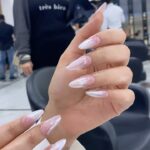 Aastha Gill Instagram - History: This time she has back to back shows, so she wanted to go for something that goes with all kind of outfits! So we decided to do (No Glue Nailextension) With nude base and for the chrome i mixed two different chrome to create this pearlish silver look! #nailsbyaryan #sunnyhairport Results: She loved her new nails transformation😇 Join👇 the masters to become the master! Next 15 days Basic To Advance Batch is coming on 15th October Next 10 days advance batch is coming on 6th October Next 2 days Master class is coming on 6th October Pre booking has started call 9971635741, 9818829019 #nailsbyaryan #sunnyhairport Enroll now: 9971635741, 9818829019