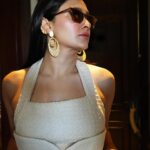 Aastha Gill Instagram - A dress up for 2 cocktails! 😅🍹🍸🍷 #aasthagill #AGOG #udaipurdiaries #raffleudaipur Stylist- @stylenmua Outfit - @sheenatrehanofficial HMU - @cashmakeupartistry Jewellery- @suhana_art_and_jewels Sunglasses - @givenchy Shoes - @chanelofficial