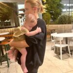 Abigail Cowen Instagram - mindin our own business & no that’s not my baby but I love him and he’s a better hugger than most