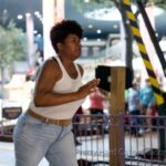 Adrienne C. Moore Instagram - #BTS It's finally here. Happy season 2 premiere @prettyhardcases . So excited the US gets to binge it on @imdbtv, soon to be freevee. I've attached BTS photos from season 2. I have more to share, but I'll start here. 1. S/O to my girl @fieldhousekdp our glorious DP (cinematographer) of 2 seasons. She runs 3 departments on set and does it so well. I would often sit in her chair cause she would let me play with her cool camera gadgets while she was setting up shots. 2. To know me on set, is to know I'm always fooling around. Here I try to use all my might to push a private plane. Think I moved it at all? 3. Love my cast. Here's @b.darenherbert and my other fearless leader friend @meredithmacneill. 4. This was a night shoot til about 5am. We were trying to get as much in before the sun came up. 5. And this is a picture of the CN Tower on that night shoot that lasted til 5am. 6. Our award winning stunt director @southcampfilms. Yep, he's my friend. He's just an all around cool guy. 7. Me chasing somebody. You'll have to watch the episodes to see which episode this was. But facts, I'm always chasing somebody on this show. 8. Didn't know I had ups did you? 9. @jaydenmccrate my buddy and mic guy. He's like my little brother. He gets on my nerves but I love him. 10. And finally Ms @hairloks who braved hella high water and seas to come support me on this journey. Thanks Arlette. She got my back. Always!