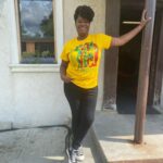 Adrienne C. Moore Instagram - F U L L C I R C L E . Funny how life comes full circle. (1) One day I walked into one of my Kelly Duff fittings and costume designer, Nicole Manek had a slew of things for me to try on. Among them were a rack of tshirts that she'd picked up from a vintage store (a Kelly Duff styling trait). I immediately recognized the design on one of the shirts. (2) Although it was advertising a university, the design, was created by renowned Black Artist, Frank Frazier. I screamed in excitement, because I knew him. I shouted, "I know this artist. His name is Frank Frazier. I used to intern for him at The Black Artist Festival in Atlanta back in highschool." He was such a kind man. (3) In '96, as a gift for interning with him, he gave me a print of one of his pieces and signed it. (4) And now, here we are, 20 years later and his art winds up on one of my character's t-shirts. (5) I swear if I EVER find the photo of us pictured together, I'm gonna repost this!