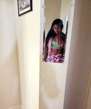 Adrienne Reese Instagram - Let's be honest... my vibe is more of a #grinchchristmas !! I look forward to using my coal for the grill this year !!! Bwhahah
#ForeverRohChamp #MinionOverLord #FallenGoddess #TheAlpha #ROHGateKeeper

P.s. 
Yes I know my mirror is scratched! Makes for a great pic!