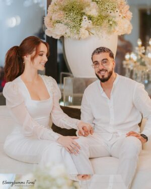 Ahlem Fekih Instagram - Mon homme, mon éternel , mon meilleur ami et mon humain préféré… Je t’aime de tout mon cœur 🤍🙏
Mua @nesrinesbiha haïr @khammarinajwa 
wearing @balkon_haute_couture 
deco @doniadeco 
pièce montée  @envie_gourmet 
taken by @firas.elwerghemmi