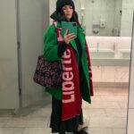 Aisling Bea Instagram - That was the winter of this content. 1- wearing all clothes possible to look like the Irish pigeon lady in the old Home Alone. Took this in a loo as I realised I was accidentally modelling a load of some nice eco bits - second hand coat from @crisis_uk scarf from @blackandbeech bag from eco Indian company @worldofikkat Choose love hoody from @pangaia nestled in there & @rothys recycled plastic shoes. What a feet/feat. 2 birthday for our Aquarius boy @kadiffkirwan to end Winter. 3 cheeky little reconstruction of my entire shoulder with a This Way Up label drawn on. Shout out to opioids, steroids, painkillers, physio & looking both ways before crossing a road in the first place. 4 a DEELICIOUS meal with the head of the mafia @imadssyriankitchen off carnaby street- OMG the food ❤️ 5 not all cats made it into the film. 6 a hot soup of hot men at the lavleeee @wildernessreserve 🔥🔥 7 xmas birthday baby @sebastiancroft 8 Kitty & I in our gorgeous @thelandskein coats which are a sustainable Irish Donegal tweed brand. 9 one of my old besties @emmalineb & I reliving our communion photo before seeing @jessieware 10 Mam & KAdiff looking cute while planning their enemy’s demises. #aislingrecommendsecoorsociallyconsciousbrandseverydayuntilxmas