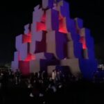Aisling Bea Instagram - @coachella people! My amazing brother in law Madhav @nebbia.works has designed this huge, INCREDIBLE installation right opposite the mainstage. It’s called Babylon and from the outside is like a giant ancient monument, but INSIDE its huge structure, it has loads of amazing changing light installations. If you are there, go find it, head inside & dance/ hide from the desert sun/ find yourself/ take cute pics hunni and tag @nebbiaworks I would have gone but I am not biologically allowed in the desert. If you are not there, still have a look as it’s pretty, bloody special. Congrats Mads and Brando. #Repost from @coachella • Art rocks this year 🎨: Babylon by @nebbia.works 📸: @googlepixel_us #TeamPixel