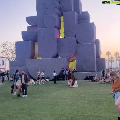 Aisling Bea Instagram - @coachella people! My amazing brother in law Madhav @nebbia.works has designed this huge, INCREDIBLE installation right opposite the mainstage. It’s called Babylon and from the outside is like a giant ancient monument, but INSIDE its huge structure, it has loads of amazing changing light installations. If you are there, go find it, head inside & dance/ hide from the desert sun/ find yourself/ take cute pics hunni and tag @nebbiaworks I would have gone but I am not biologically allowed in the desert. If you are not there, still have a look as it’s pretty, bloody special. Congrats Mads and Brando. #Repost from @coachella • Art rocks this year 🎨: Babylon by @nebbia.works 📸: @googlepixel_us #TeamPixel
