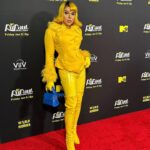 Aja Instagram - It’s my birthday and I storm the red carpet if I want to 💛 👗 @blackandwhitestriped