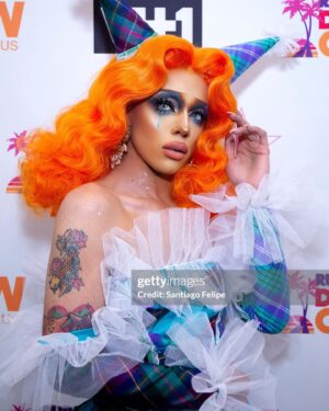 Aja Instagram - People are always talking about how they want this Aja to come back. But the truth is in this era of my life I was not being authentic to myself, and I kept formfitting myself to be something I wasn’t because I felt so unloved for being who I was I created this character that I knew to world with love, and it was, the true pinnacle of my artistry. Taking things that I saw people loved and styling it to myself. Now that I am fully realizing who I really am though. I know that it would be a different story.

I look back and see the way that this turned into the infamous “burlesque rapper” era and I cringe, because I don’t think that that was some thing that I really wanted either. I think all I really wanted was to be seen as a woman and not a person who is performing the caricatures of a woman. But I was in such denial. I often feel that this era of my artistry ruined a lot of my career and pushed away thousands and maybe even hundreds of thousands of fans I’ve watched slowly over the past few years as I ago from almost hitting 1, million followers on Instagram to pinching back down and the constant commentary about “ didn’t she quit?” And such. My one confession today is that I really wish I would have had the resources to overcome my gender, dysphoria and privacy, and not made my struggles so public. I often wonder how differently it would affect my career today. Nonetheless, I am very proud of the woman I have become and I hope one day those hundreds of thousands of fans that I have lost can look back and learn to love me again. Because as it stands, I feel like compared to before it is much more a few people who are supporting my artistry at the moment, and it has led to a lot of me doubting the future of my artistry but with that I say, I will stay and stand strong. I know that I have not hit my peak yet as I get ready to load my next era, I said buckle up kids. This one is for you. 💛✨🩸