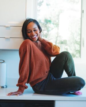 Aja Naomi King Instagram - Doesn’t everyone sit on their kitchen countertops posing waiting for food to magically appear…that’s how cooking works, right?! 🫠