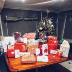 Alexa PenaVega Instagram - 🎄feliz navidad from our familia to yours!🎄 (pretending that the @fsorlando tree is ours for the season 🤣. Swipe to see our awesome boat Christmas!)