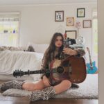 Alexis Jayde Burnett Instagram - this guitar knows everything