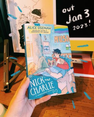 Alice Oseman Instagram - My novella NICK AND CHARLIE is out in the US/Canada in hardcover on Jan 3rd 2023 and I finally have a copy of it!!! I am actually obsessed with how this cover turned out. Perfect snuggly cosy Nick and Charlie vibes!!! ☀️🌙 
You can preorder now from most book retailers!