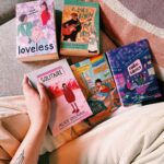 Alice Oseman Instagram – The new UK editions of my novels are out TODAY! 📚 I feel so lucky to have these editions out in the world, with covers designed by me. I am so proud of all of these stories… each one feels like a step forward creatively where I tried something a little new. While I sometimes look back and think ‘hmm could I have done that better’, they’re all a true representation of exactly what I wanted to make at the time, and I gave everything to them, and I love them for that. I can’t wait to get back to writing prose eventually!

ALL of these editions contain bonus content…
Solitaire = a Q&A with me by YA icon David Levithan!
Radio Silence = an author’s note about my relationship with education and creativity
IWBFT = my short story GHOSTED, which is about Rowan and Lister
Loveless = my short story HANDS AGAINST OUR HEARTS, which is about Pip and Rooney
Nick and Charlie = my short story FIRST DAY, which is about Nick’s first day at uni!

And lastly, just a small note to say that there will be a new UK paperback of THIS WINTER as well… but not till later this year! 🎄

Thank you so much everyone for your support 💖