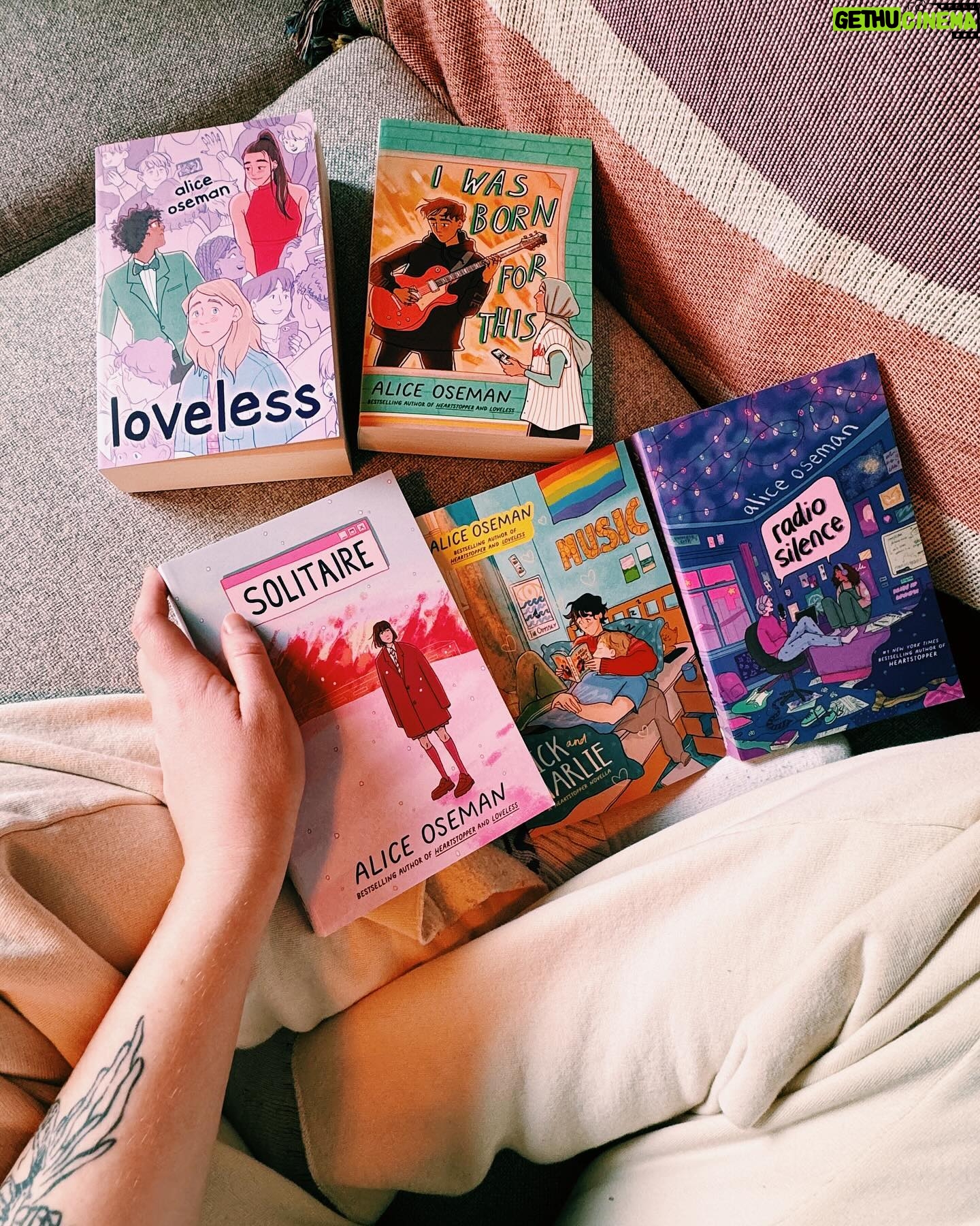 Alice Oseman Instagram - The new UK editions of my novels are out TODAY! 📚 I feel so lucky to have these editions out in the world, with covers designed by me. I am so proud of all of these stories… each one feels like a step forward creatively where I tried something a little new. While I sometimes look back and think ‘hmm could I have done that better’, they’re all a true representation of exactly what I wanted to make at the time, and I gave everything to them, and I love them for that. I can’t wait to get back to writing prose eventually! ALL of these editions contain bonus content... Solitaire = a Q&A with me by YA icon David Levithan! Radio Silence = an author’s note about my relationship with education and creativity IWBFT = my short story GHOSTED, which is about Rowan and Lister Loveless = my short story HANDS AGAINST OUR HEARTS, which is about Pip and Rooney Nick and Charlie = my short story FIRST DAY, which is about Nick’s first day at uni! And lastly, just a small note to say that there will be a new UK paperback of THIS WINTER as well… but not till later this year! 🎄 Thank you so much everyone for your support 💖