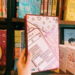 Alice Oseman Instagram - Out today… the special edition hardback of Heartstopper Volume 2!!! Soooo in love with how these three books look together. This one contains one of my oldest mini comics, ‘Flower Shop’! You can buy these special editions from most UK book retailers! 🌸