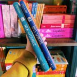 Alice Oseman Instagram - My copy of THIS WINTER is here and I’m so so so in love with it!!!🎄🌧️❤️‍🩹 This is an illustrated prose novella about the Christmas Day that precedes SOLITAIRE. I originally released it as an ebook in 2015! This new edition has a cover illustrated by me and has some new Nick and Charlie festive sketches in the back 🥹 It’s being released in the US on September 5th and you can preorder now!
