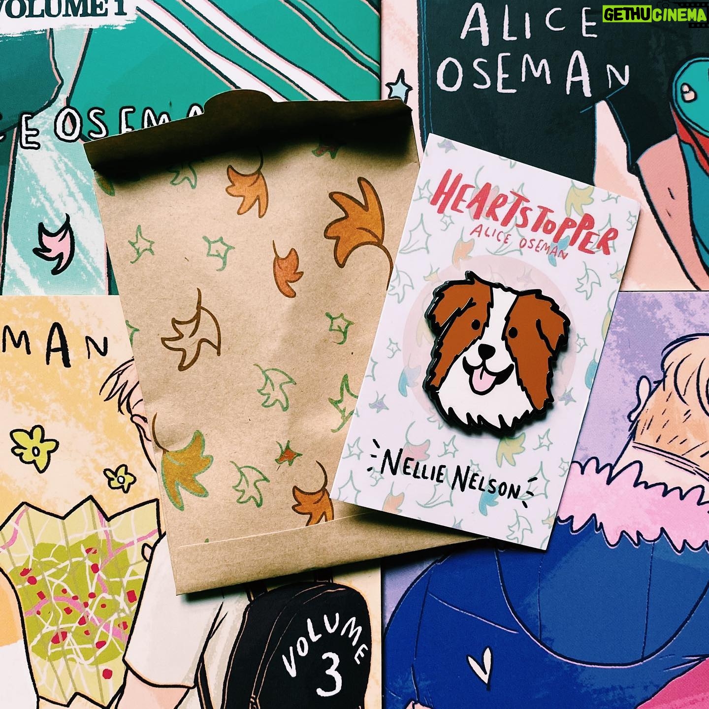 Alice Oseman Instagram - Several years ago I used to sell Heartstopper enamel pins on my own online shop… and now with the help of @litpinsandco I’m bringing them back! These official Nellie pins are available now at @litpinsandco, with 10% of the proceeds going to @genderedintelligence. I’m so excited to be able to bring Heartstopper enamel pins back and I’m excited to design some new ones in the near future! 🐶🍂 https://litpinsandco.com/collections/heartstopper/products/nellie-heartstopper-pin