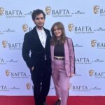 Alice Oseman Instagram - We may not have triumphed over Paddington and the queen… but we still had a fun time at the BAFTAs 🥹 Huge thanks to @andrianimakeup and @chadmaxwellhair for the makeup and hair!! And thanks to @wearewildfang for sending me this excellent suit 🩷