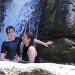 Alicia Silverstone Instagram - While white water rafting, Bear and I enjoined this nice refreshing moment. It was hard to keep balance on rocks and under the waterfall 😂🥰