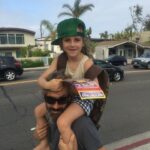 Alicia Silverstone Instagram - I love this photo from long ago of my brother David and Bear 🥰 So cute! Omg how I miss my little Bear… 🥺 #FBF PS: Happy birthday @davidsilverdragon!