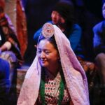 Alisha Rai Instagram – Eveyday at 5 P.M  at Mandala theater except Monday.
‘Bakhamma’ is a Mundhumi character often heard of among the Kirat Rai caste, but given little attention. According to MUNDHUM, the formless creator Rumuhang (Paruhang) created Bakhamma by mixing ash and clay in water formed by dew.

In Kirat Rai culture, Mundhumi stories are a must in any event from birth to death. Especially the stories of ‘Hetchakuppa, Tayama, and Khiyama’, along with many more of ‘Sumnima-Paruhang’, are told. Though these stories are referred to and told with different names, styles, and images, there is almost a common consensus around the Rai community about Sumnima-Paruhang being the creator. Thus, ‘Sumnima-Paruhang’ is taken as a symbol of unity and faith within the Kirat Rai community. They also equally believe in Salpa Silichung, a place chosen by Paruhang as a pure and holy place during the creation of human beings. They believe Silichung to be a symbol of Sumnima-Paruhang.

In the play ‘Bakhamma: Man in Mundhum’, we aim to explore and understand the culture, experiences, knowledge, and cultural beauty of Indigenous (Raithane) culture, knowledge, or cultural beauty created during the development of civilization, which has been faithfully preserved till today by the Kirat Rai community. Among the many stories of Kirat Rai origins, we attempt here to tell the story of the First Man based on the MUNDHUM.

We believe that this effort also strengthens the movement for cultural identity in our search for our roots. Throughout the drama, we address the belief in the beauty and originality of our Indigenous heritage and encourage efforts to promote it. And there is always something to discuss.