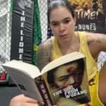 Amanda Nunes Instagram - During each workout break, I dive into the pages of the book @thegirlfromwudang 🤩🥋 It’s like being in the octagon 🔥 @pjcaldas is a Brazilian best-selling author, and that’s his first novel in English! Get yours too 👊🏼 . A cada pausa do treino, mergulho nas páginas do livro @thegirlfromwudang 🤩🥋 É como estar no octógono 🔥 @pjcaldas é um autor best-seller brasileiro, e este é o seu primeiro livro em inglês! Garanta o seu também 👊🏼