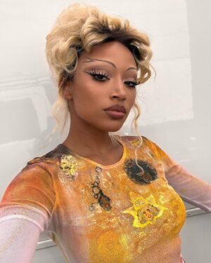 Amandla Stenberg Instagram - here’s my full look for Drag Race :*☆ lemme tell u I was BESIDE MYSELF when this offer came thru. the assignment was real so I painted these iconic queens on my shirt. my makeup artist Kennedy and I have been growing with each other for 7 years now and this felt like a beautiful culmination of our work together. U TORE KENNEDY ! and @vernonfrancois always turns it out. I am so lucky that queer expression has been such a definitive part of my life. drag culture has taught me how to be my most uncompromising self. thank you to Ru, the queens of season 15, and the drag artists splashing their magic across the world. (  @zaraeloise for letting me borrow this chopova skirt in a pinch (^_-))