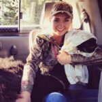 Amber Marshall Instagram – #MarshallSundayStory: Last week I told you the story of how my cat Turner came to live with me. This week, (after many requests) we will learn more about #BettyTheAlpaca who lived with us for a decade before she crossed the rainbow bridge. 

It was the summer of 2013 and I was at a ranch with my friend @KatieConnolley looking at some horses that were for sale. There was a lone alpaca there, so asked what her story was. The owner said he didn’t know how old she was, or much about her, as she had been left behind from a previous herd. He then said, “If you want her she’s yours.” 

I had no experience with llamas or alpacas but something about her just made me want to bring her home. She was not tame, and we had to wrangle her into a small pen, then rope and tackle her. I put an old t-shirt over her face to keep her calm, then we lifted her into the backseat of my truck – we hadn’t brought a trailer, so I sat holding her while my friend Katie drove us home (see last photo that was taken when we arrived home). 

I decided to turn her out with my cows so she wasn’t alone, and instantly she loped over to the young calves and started grooming them. She became Nanny Betty from then on. She took her job so seriously she would never let the calves out of her sight. My moma cows began trusting Betty, and would leave their calves with her for hours while they went out further to graze. 
Over the years Betty really warmed up to me. She even learned how to be haltered and walk nicely while being led. I miss Betty, as do my cows, and I’m not sure I will ever find another alpaca like her. ❤️

🦙 Story too long for this post, I have continued in the comments. 

See more of Betty on Instagram here: #BettyTheAlpaca