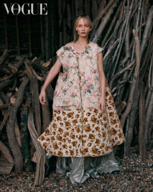 Amber Valletta Instagram - “I turn 50 this February, meaning I’ve worked in fashion for 35 years, and I’ve been a sustainability advocate for more than 20 of those, but in 2023 I hit a wall, mentally and physically,” confesses @AmberValletta. “The news just felt relentlessly bad – environmental and otherwise. I knew that, if I was ever going to get back on my feet, I needed to find a more sustainable approach to sustainability work.” In the January 2024 issue of #BritishVogue, the model and climate advocate reveals her path towards a more conscious future – and how fashion is following her. Click the link in bio to read the interview and see the full story in the new issue, on newsstands Tuesday 19 December.

#AmberValletta photographed by @CharlotteMWales and styled by @PoppyKain, with hair by #ShingoShibata, make-up by #KanakoTakase, nails by @TrishLomax, set design by @MaxBellhouse, movement director by @EricVonChristison and production by @FaragoProjects.

[Image one shows Amber Valletta, a white woman, from the knees up, sitting in front of a haystack in what appears to be a barn. She looks directly at the camera, her blonde hair loosely tied up, and wears a white mid-length dress underneath a white cape with a white scarf tied around her neck. A large gold pendant, roughly the shape of a horseshoe, hangs at her sternum on a leather chain.

Image two shows a full-length portrait of Amber Valletta, a white woman, in a clearing, a forest visible in the background behind her, looking directly at the camera. She is standing with her legs slightly splayed and wears a wide-brimmed dark brown hat, a ribbon tied around its crown. She has a pair of khaki trousers on, while a light pink collared shirt peeks out of the top of her brown trench coat, whose belt is tied insouciantly at her waist.

Image three shows a full-length portrait of Amber Valletta, a white woman, standing in front of a pile of kindling and firewood. She wears a quilted floral sleeveless coat liner with an oversized zip over a silver metallic gown. The wind is blowing locks of her shoulder-length blonde hair across her face, and her right arm rests casually on a piece of wood.]