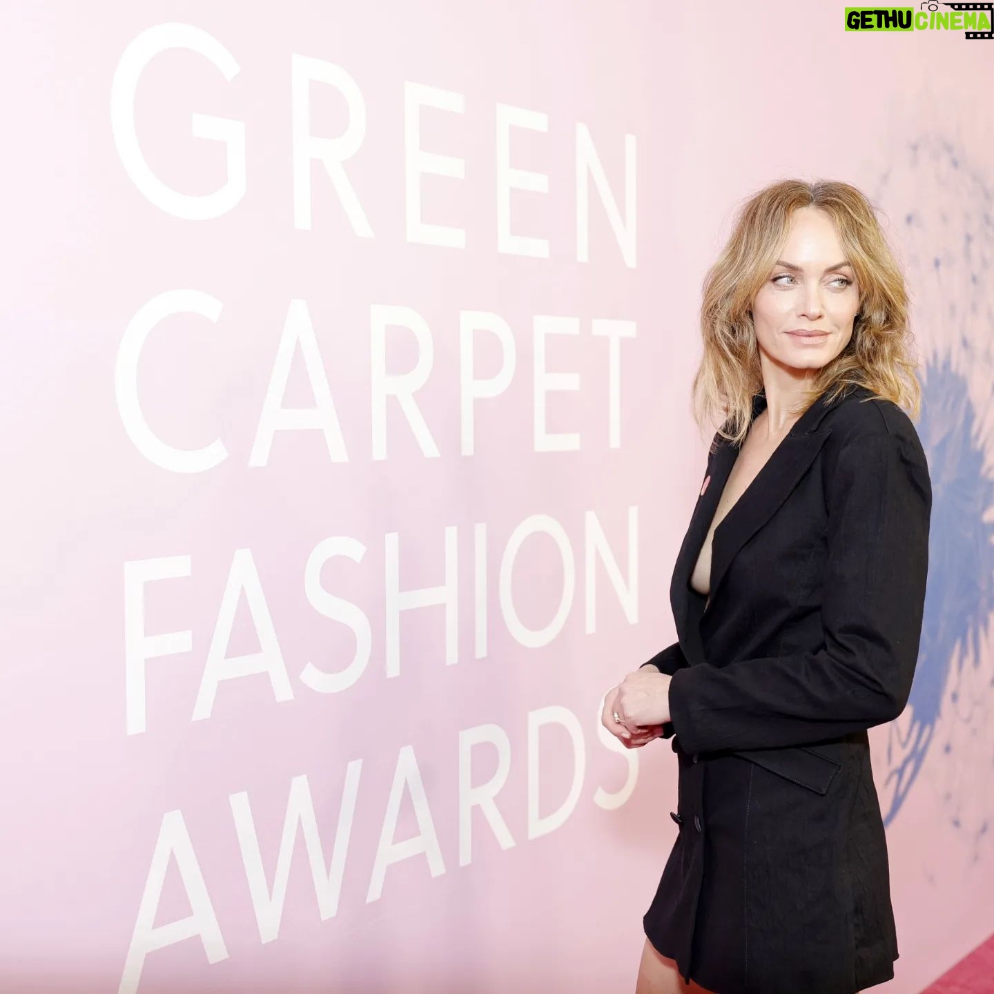 Amber Valletta Instagram - A surprise moment during the Green Carpet Fashion Awards; @AmberValletta challenging guests to eat their jeans! Pasta was served with tomatoes 🍅 grown using @candianidenim COREVA denim - the same material was used to create her bespoke dress designed by @triarchy. @triarchy: "We are very proud to create a bespoke look for Amber using our plastic-free stretch denim. As this is a "green" carpet, we wanted to design something unexpected using denim. Our first thought was a dress, but we have always been inspired by a woman in a classic tuxedo. The result was an amalgamation of the two." The short tuxedo jacket features a traditional double lapel collar, button front, and slim sleeves. The back features a feminine low scoop to give a formal element to the design, which was executed using plastic-free stretch denim in sustainable onyx black. #GreenCarpetFashionAwards #CanYouEatYourJeans? #CorevaDenim #Triarchy #Candiani #ambervalletta