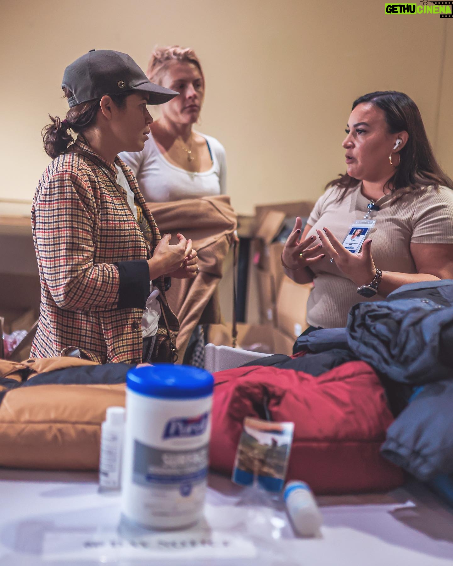 America Ferrera Instagram - Taking part in a little humanity can do a lot for our broken hearts. I was so glad to help hand out 700 winter coats at a shelter for asylum seekers in New York City this week. I’m grateful to the asylum seekers who shared their experiences with us. Many of them are families and individuals fleeing persecution from their governments, running from gangs that threaten their families, escaping starvation, desperation or economic destitution in failed states. All of them are human beings looking for a chance to build a better life. I was proud to witness how New York City is working to meet them with resources and humanity, but what is absolutely clear is that more support is needed from the state and federal government to continue welcoming these men, women, and children with dignity. We have a failed immigration system that leaves most people with only dangerous and undignified options during a time of increased forced migration around the world. That is wrong. And it is wrong that once they arrive they aren’t getting the support they need, and that our country is making it incredibly hard for them to be able to work legally. I urge @potus to deal with the issue of our broken immigration system and to take action that will welcome people with dignity, build more safe and humane immigration pathways, and provide real help to cities like New York attempting to welcome migrants with humanity. In the mean time, we can all play a part in offering humanity to other human beings seeking refuge. I encourage you to follow @thisisabouthumanity, @immdef_lawcenter, and @fwdus to stay up-to-date on immigration policies and to learn about volunteer opportunities as they become available. #WelcomeWithDignity #ThisisAboutHumanity Thank you to @thisisabouthumanity for bringing community together in service of others and to the @nycemergencymanagement @zachiscol for coordinating the visit. Photos by @ericapress.jpg