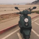 Amy Dumas Instagram - I’m saddened to make this post but…. my faithful @genuinescooters Hoolie of 10 years was stolen today. If you’re in SF keep a lookout for a matte green Genuine Hooligan. It has been registered as stolen. If you’re in the Bay Area please share. Maybe I can find her before she’s chopped and stripped 🥹 These pics are from happier days over the years. I haven’t known a life without my scoot in 15 years. I’ve put so many miles on these 2 wheels- she was a little beat up- but I wouldn’t have traded her for anything. 🥹🥹 #scooter #scooterlife #twowheels