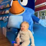 Amy Hart Instagram - This Episode Of Bluey Is Called Stanley’s First Birthday 🎂 💙🩵 The best time for my little boys first birthday 🎁 Theme:I looked on Pinterest and sent @everylastdetail_x a reeeally long voice note and as always they delivered!!! Even down to themed waters, biscuits from @thecupcakecollectionx , dog bowls instead of plates and little bone name tags 🥲. Roll on my UK hen do!! Food: I got pizzas for the adults, lots of different cans of drink and my Nan brought some cupcakes 🤣 For the babies I just went online and ordered so so many @kiddyliciousuk snacks. Felt this was the best zero waste option as now our cupboard is stocked with the ones we didn’t use!! My mum also did a tray of sandwiches and a tray of chicken dippers and sausages. Activities: We used two local family run companies, @rentyoureventsussex for the bluey soft play and DSH Leisure for the bouncy castle. I had DSH castles my whole childhood so really special that we can now use them for Stanley!! We also had @one_stop_partyshop come along with Bluey herself! I tried to book the full 2 hour party but they recommended that we just did 30 mins and it was fab! Games, singing and dancing and a meet and greet! I also used to do panto with Blueys party assistant so it really was the most Worthing party you can get 🤣 Cake: We used @kellyscakes_ We had white chocolate and raspberry (Stanley’s faves) and it was sooo good! Also very reasonably priced and I finally managed to order a cake for the size of the guest list and not for the feeding of the 5000!! Outfit: @indielledesigns 💙 my go to for seasonal clothing! Party Boxes: I had seen adopt a floppy on Pinterest so asked @my1styears if we could do a bulk order of the bunnies, they took it extra and gifted everyone a personalised denim jacket 😢 I also bought a box of bubble wands off Amazon and each child got a little book too! (Little libraries, also from Amazon!) (m1y also gave me a discount code which is AMYHART10 xx)