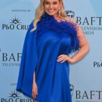 Amy Hart Instagram – Pinch me I’m dreaming! 💭 Amazing night at @bafta nominees party with @pandocruises 🤩 

Dress: @raganddoll 
Styling: @jeffmehmet1 
Hair and Make Up: @marcosgmakeup 
Shoes: @kurtgeiger
