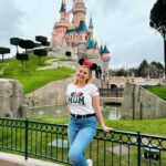 Amy Hart Instagram - Few more Family Snaps and how we got them! 🐭📸 1) On the grand staircase at Disneyland Hotel (lots of people still asking what the best way to book this is, all the info is in my massive trip report but we booked with @attractionticketsdotcom ). The level of customer service in this hotel is just mega!! There are so many cast members ready to help you. In the lobby there are people milling around in the uniform but with a top hat on…they know all the photo spots, all the angles AND the lovely lady who took this got a shiny sticker out of her pocket to get Stanley’s attention 🤣 they give them out to kids in the lobby! These T-shirts are @ukgap but we got them from @nextofficial ! Stanley’s tracksuit is from @georgeatasda 2) This big throne is on the 2nd floor of the Disneyland Hotel in the corridor that goes towards the gift shop and the restaurants! 3) now, I messed up with this one a bit 🤣 everyone had said about going to the left of the castle, we got up early the day before and had pictures on a very quiet Main Street but thought I’d check it out for any lie in lovers, but I think I went too far left! This is still a nice photo (she says 🤣) but I think if you go to that little bridge behind me you get more of a front on view of the castle! It was like 5 degrees but my puffa just wasn’t looking fly 🤣 4) Whilst Sam was taking picture 2, again a cast member walked past and asked if we’d like a full family photo! I feel like Stanley looks like a proper kid in these 🤣 5) Again the lovely lady in the top hat suggested we got one in front of the fire place too! We love a helpful insta gal! Next time we go, what other iconic pics should we get?! #disney #disneyland #disneyworld #disneygram #disneylife #disneyprincess #waltdisneyworld #love #mickeymouse #marvel #starwars #disneyparks #frozen #disneyfan #disneylove #disneyplus #waltdisney #wdw #instadisney #disneylandparis #disneymagic #pixar #disneychannel #disneyaddict #toystory #disneyinsta #magickingdom #disneyphotography #disneylandhotel
