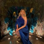 Amy Hart Instagram - One week to go til the BAFTA’s, this is the last set of blue dress pics I promise 🤣🤣. Just wanted to leave number 2 in there to remind you skin texture is normal! Had my dress fitting today for the ceremony next week, what do you think I’ve gone for?! #baftas #glam #redcarpetfashion #baftatvawards #nightout #peacockfeathers