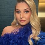 Amy Hart Instagram - One week to go til the BAFTA’s, this is the last set of blue dress pics I promise 🤣🤣. Just wanted to leave number 2 in there to remind you skin texture is normal! Had my dress fitting today for the ceremony next week, what do you think I’ve gone for?! #baftas #glam #redcarpetfashion #baftatvawards #nightout #peacockfeathers
