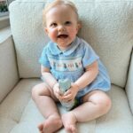 Amy Hart Instagram - Hop Little Bunny Hop Hop Hop 🐣🐇🐰🪺🍫 hope you’ve all had a lovely Easter weekend….and it’s not over yet!! Tomorrow I’m making my first return to Drag Queen Sundays (Mondays…) since 2022! I think it may not end well 🤣 Stanley’s little romper is from @rachelrileyuk , love the traditional stuff on him 🥲 #easter #eastersunday #rachelriley #romper #traditionalbabyboysclothes #babyromper #spanishbabywear #spanishbabyclothes