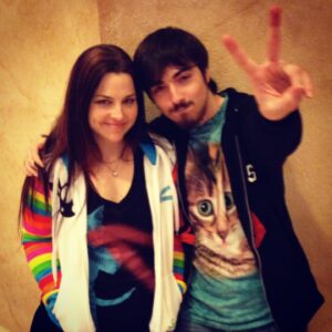 Amy Lee Instagram - Happy birthday, Robby. I miss you every day. As sad as it makes me that you’re gone, I hope you know that remembering you means smiling. You were hilarious- always making us laugh, always focusing on the comedy, always looking “on the bright side of life” to quote your Monty Python fav. We took this photo right after a Tenacious D show in 2013 where we sang (no exaggeration) EVERY WORD (which you can see we are still doing in the second pic) 😆 One of the best nights of our lives! I love you forever.