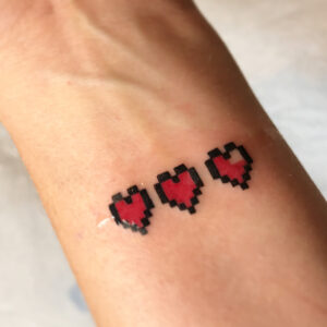 Amy Lee Instagram - Well, I held out for 36 years but today I got my first tattoo. It’s exactly what my brother wanted, but didn’t get the chance to get. I always thought it was cool but it means more to me now. Besides the fact that playing Zelda together was one of our favorite things, he took a piece of my heart with him when he left. I love you forever, Robby!